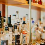 liquor bottles behind a bar